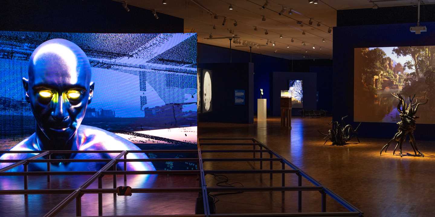 A section of the exhibition hall for MUNCH Triennale – Almost Unreal, showing six of the works on display. Photograph.