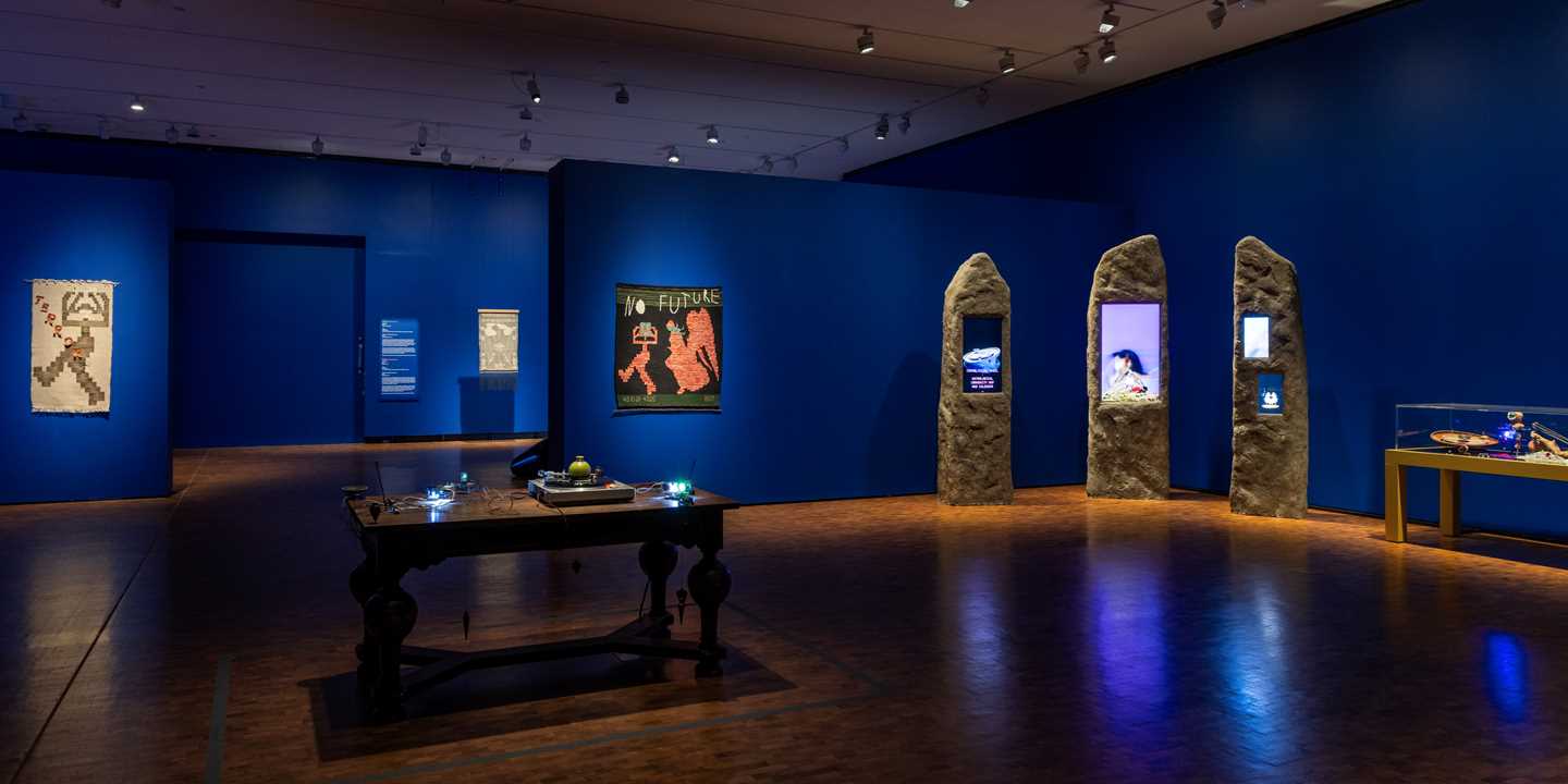 A section of the exhibition hall for MUNCH Triennale – Almost Unreal, showing six of the works on display. Photograph.