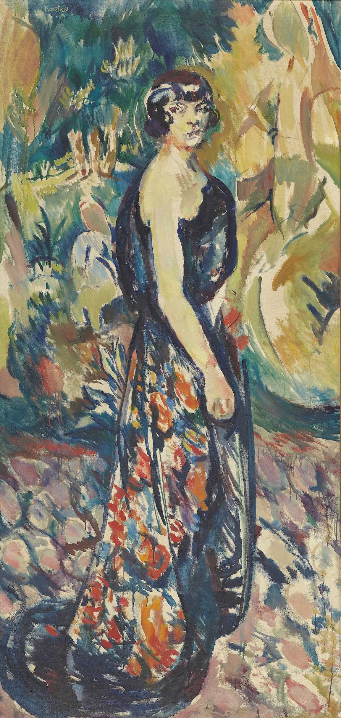 Asta Nielsen står i profil, men vender hodet sitt mot oss. Hun har på seg en fotsid kjole som kun er festet over den skulderen som er lengst fra oss. I bakgrunnen ser vi trær og busker. Maleri